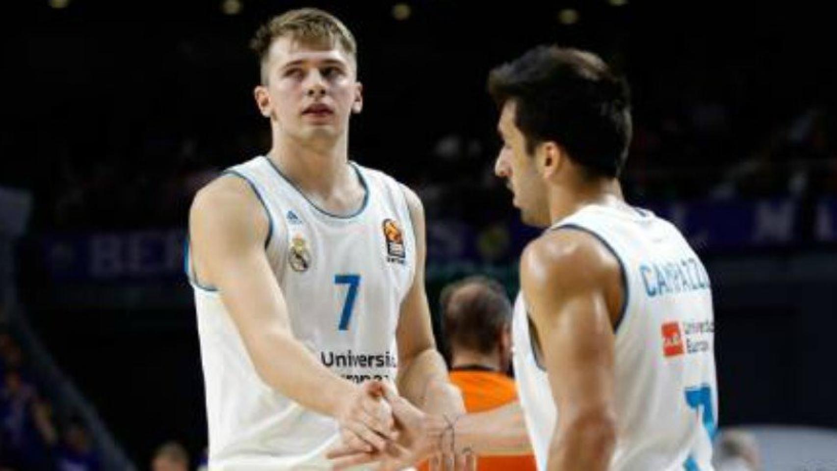 Doncic y Campazzo celebran una canasta