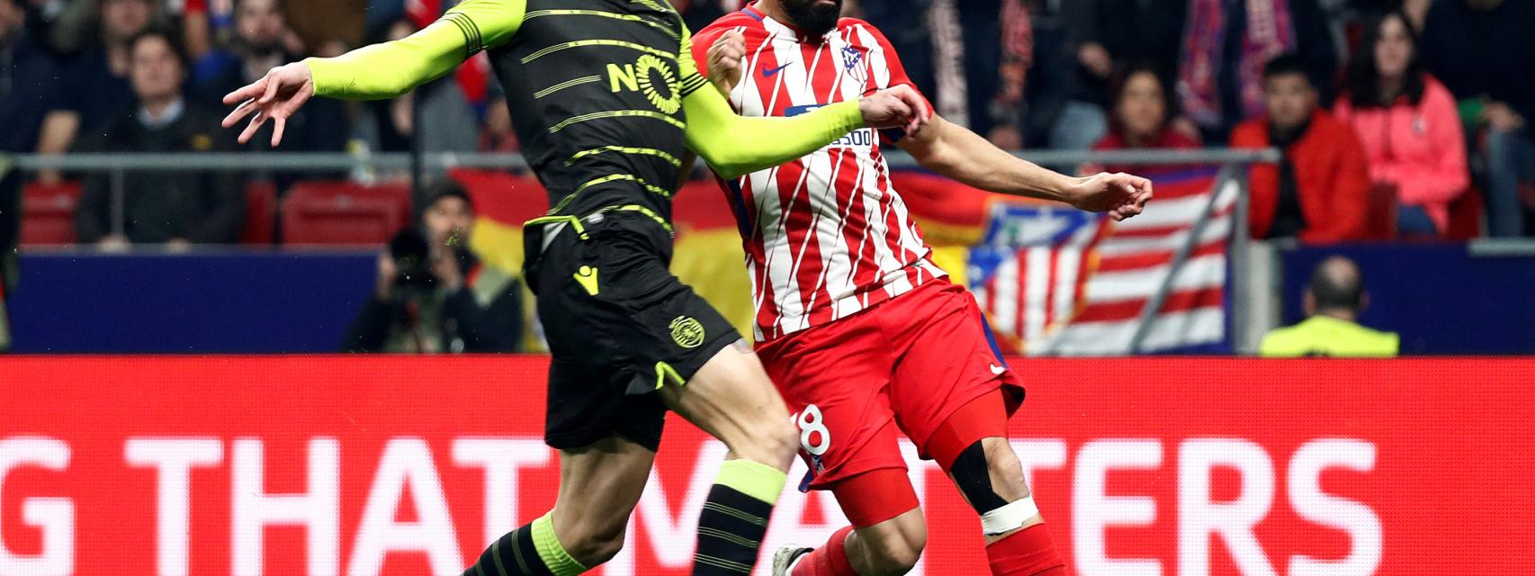 Griezmann y Diego Costa celebran un gol.