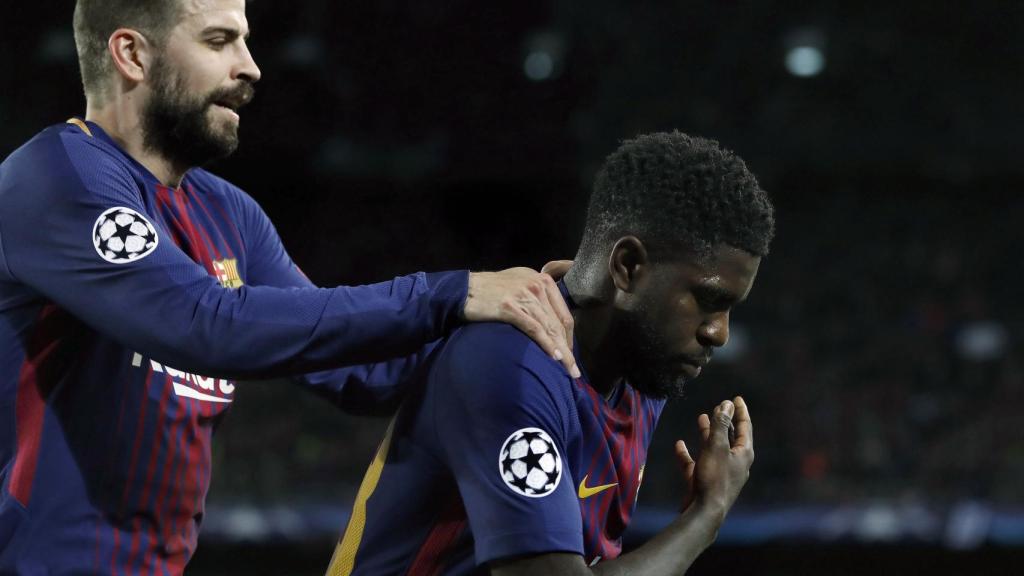 Piqué celebra con Umtiti un gol del Barcelona a la Roma.