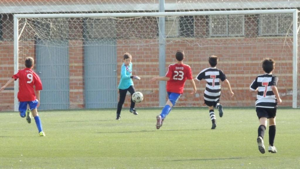 Partido de alevines de fútbol.