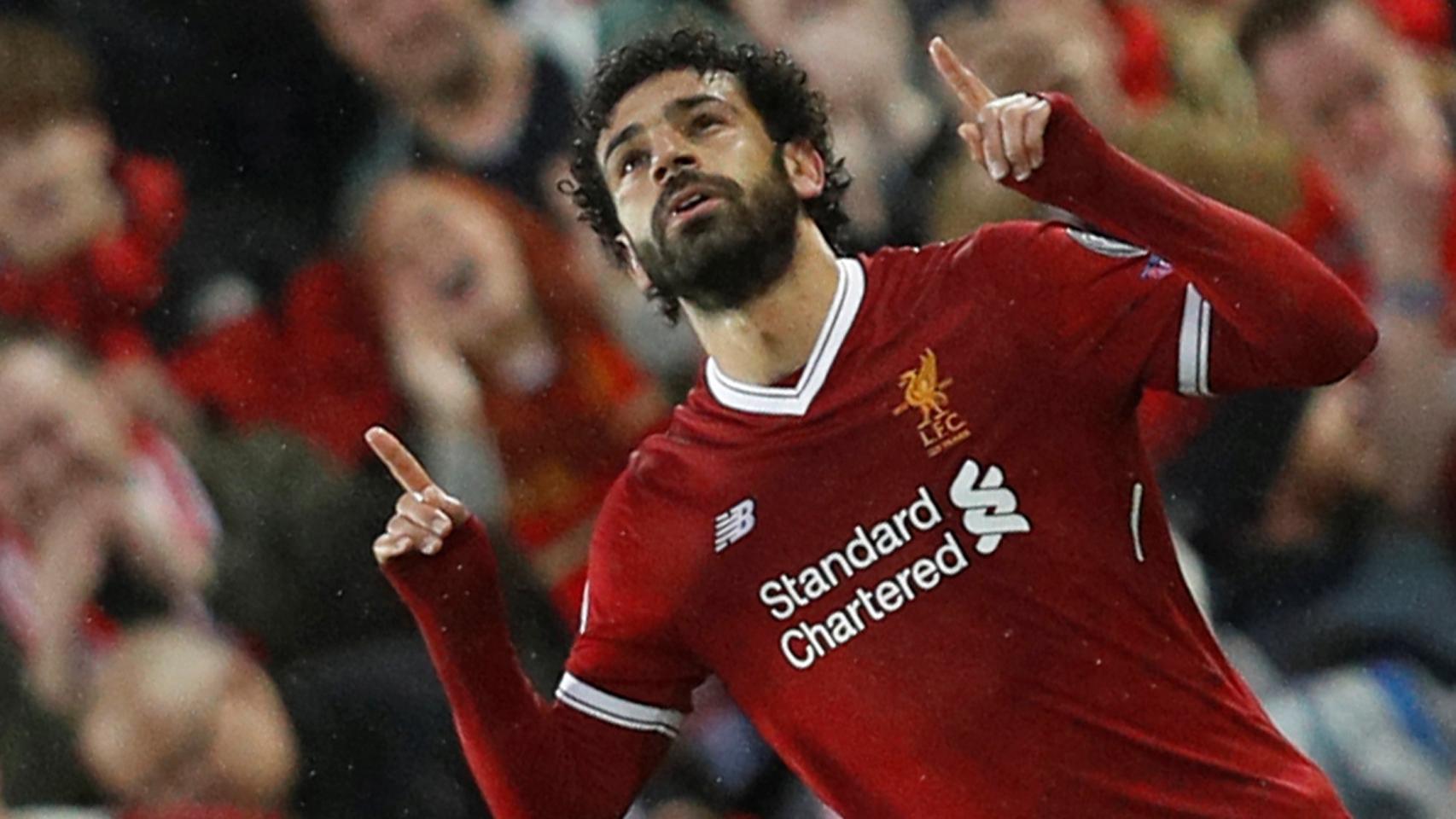 Salah celebra uno de los goles en el Liverpool - Roma.