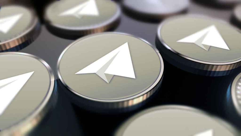 Imagen representativa de criptomonedas con el logotipo de Telegram.