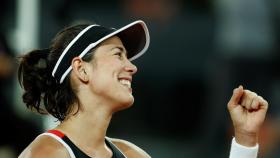 Garbiñe Muguruza celebra su victoria ante Donna Vekic.