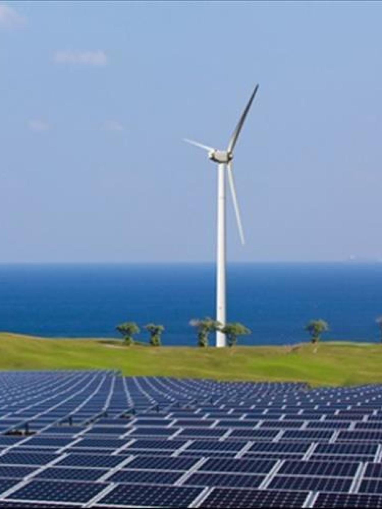 Placas solares junto a molinos de viento.