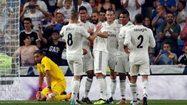 El Real Madrid celebra un gol ante el Milan