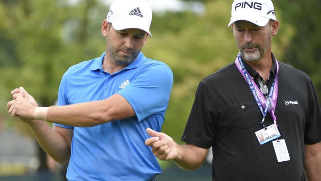 Sergio García conversa con Stan Utley, su entrenador de swing, durante el pasado US Open.