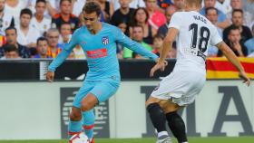 Griezmann y Wass, en el Valencia - Atlético de Madrid