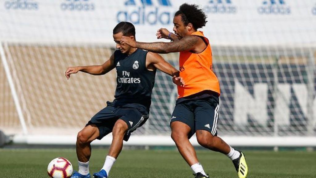 Lucas Vázquez  y Marcelo durante el entrenamineto