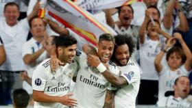 Asensio, Mariano y Marcelo celebran un gol en el Santiago Bernabéu