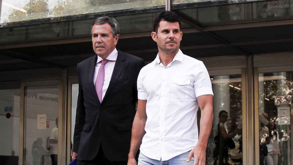 Fernando Osuna y Javier Santos saliendo del juzgado.