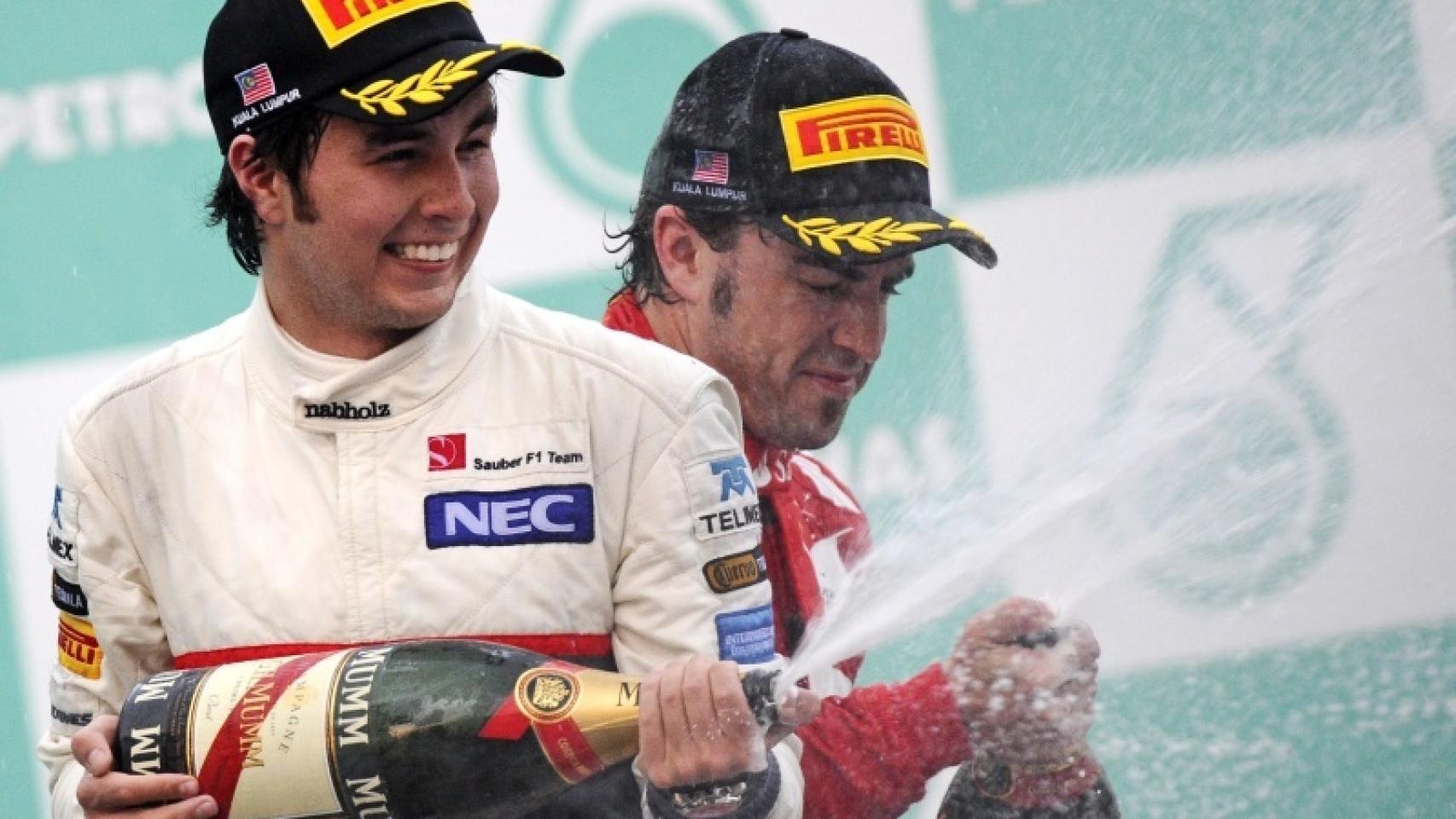 Sergio Pérez y Feranando Alonso el el podio del GP de Malasia 2012