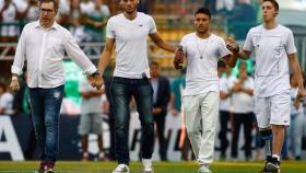 Rafael Henzel, Helio Neto, Alan Ruschel y Jackson Follmann en el partido de la Recopa ante Atlético Nacional. Foto: Instagram(@rafaelhenzeloficial)