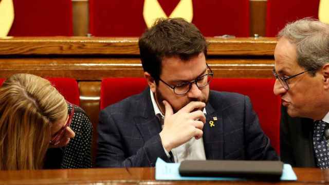 Torra, Aragonés y Artadi, en el Parlamento catalán./