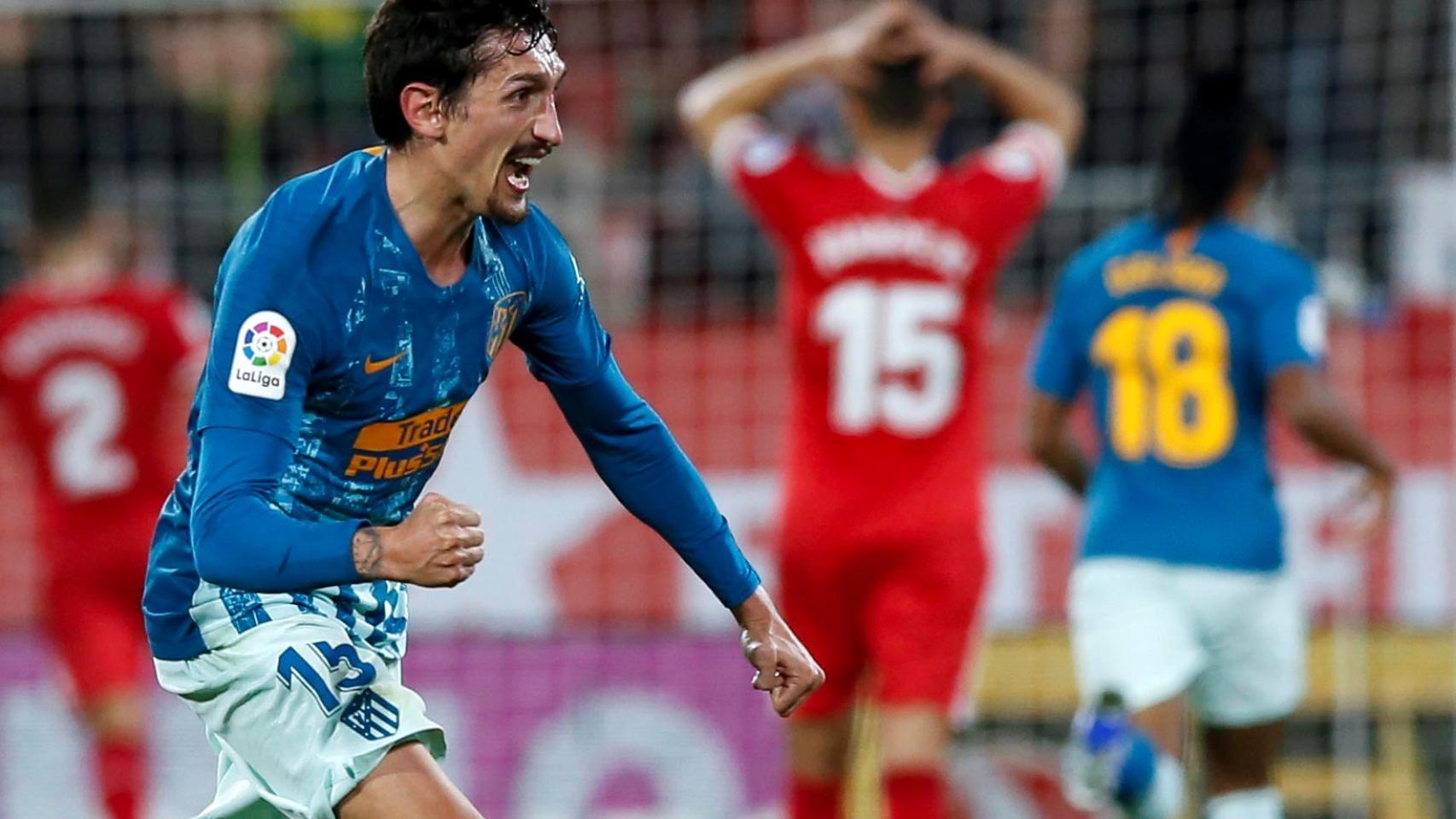 Los jugadores del Atlético celebran el gol del empate ante el Girona