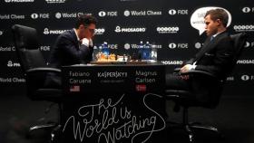 carlsen+caruana+reuters