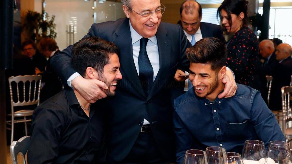 El abrazo de Florentino a Isco y Asensio en la comida de Navidad