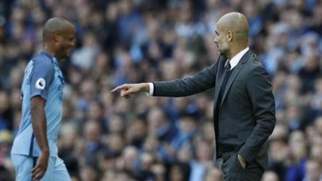 Pep Guardiola y Vincent Kompany