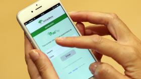 Unicaja lanza un servicio de pago con el móvil en comercios