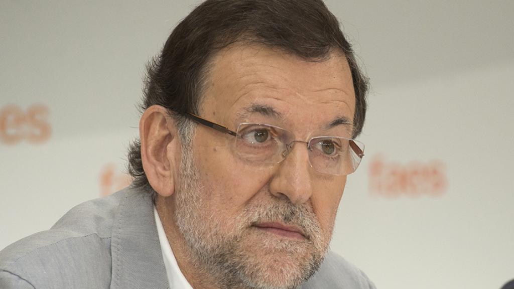 Mariano Rajoy y José María Aznar en 2013.