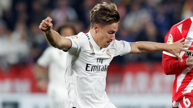 Marcos Llorente, robando un balón al Girona