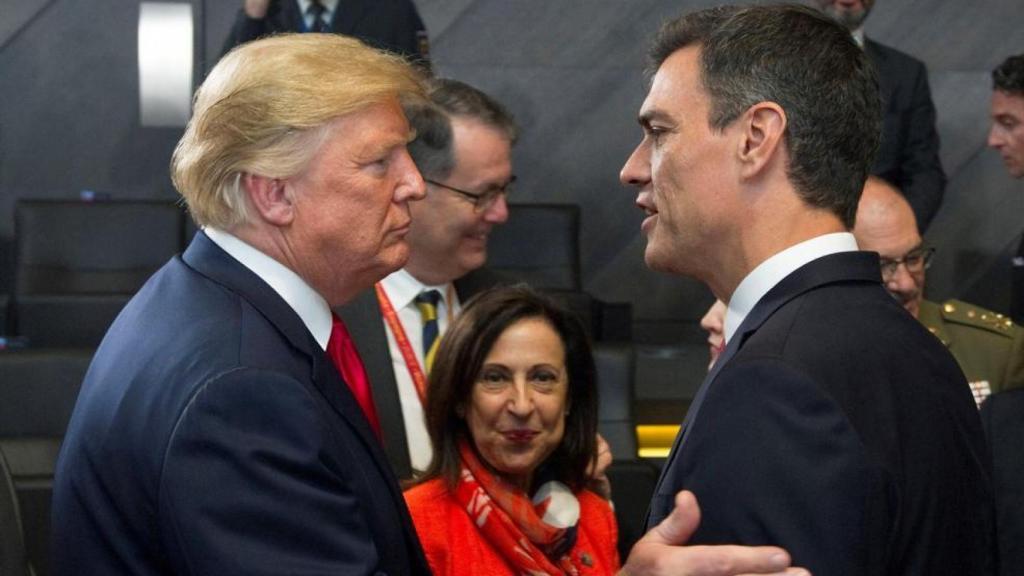 Donald Trump, Margarita Robles y Pedro Sánchez, en una cumbre de la OTAN celebrada en julio de 2018.