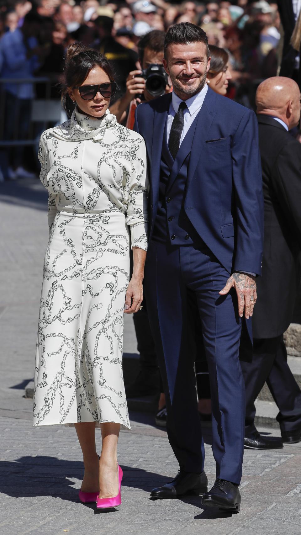 Victoria y David Beckham han llegado en mitad de una gran ovación sevillana.