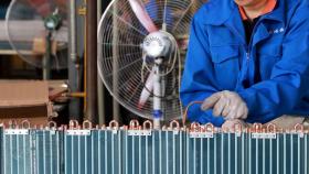 Fábrica de ventiladores y climatizadores en China. Reuters.