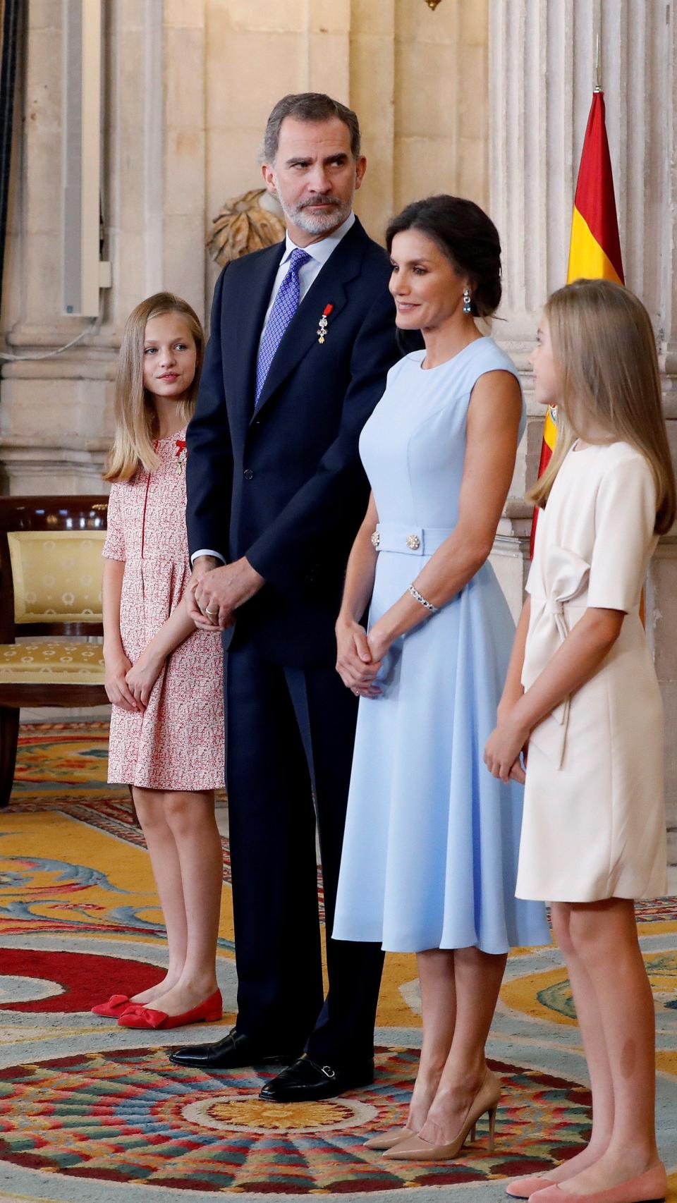 La Familia Real en el Salón de las Columnas del Palacio Real.