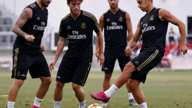 Isco, Odriozola y Lucas Vázquez durante un entrenamiento con el Real Madrid