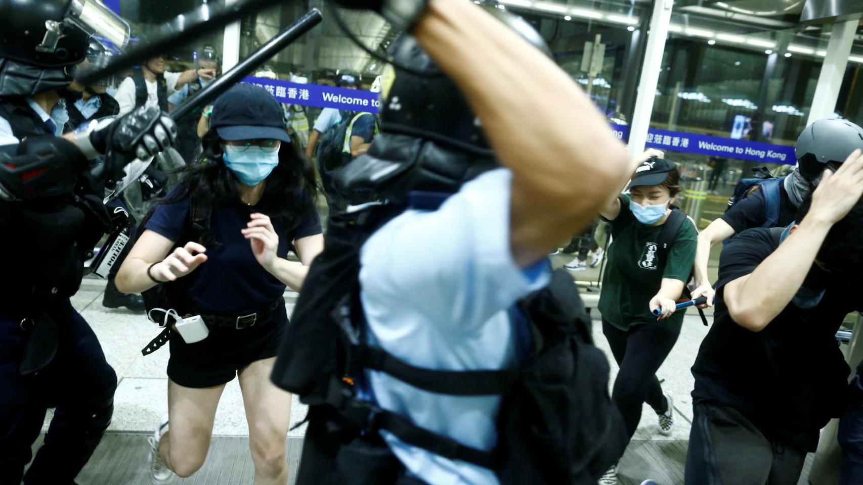 Disturbios entre la policía y los manifestantes.