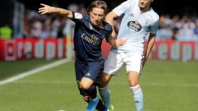 Modric, derribado por un rival