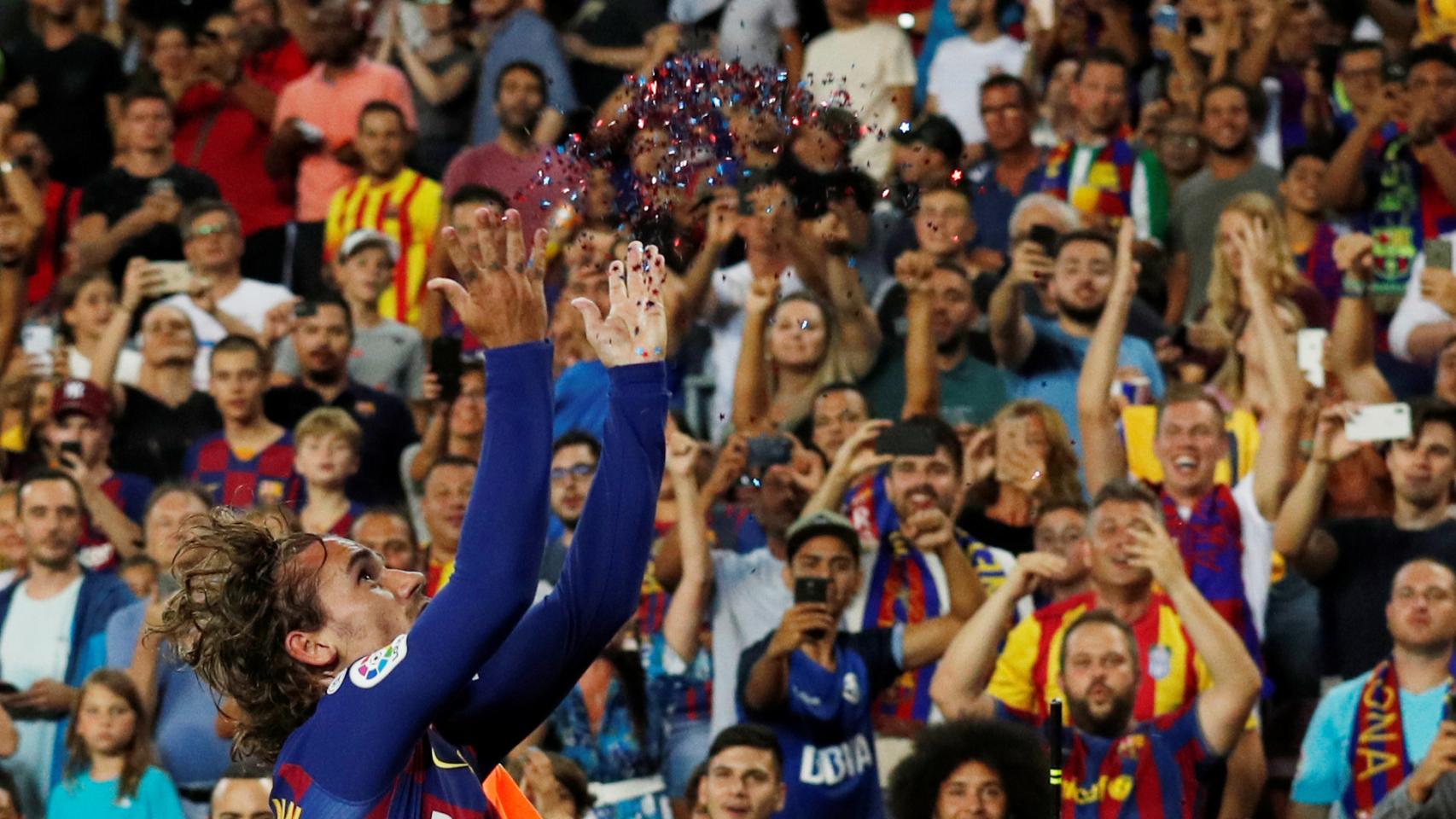 Griezmann celebra tirando confeti