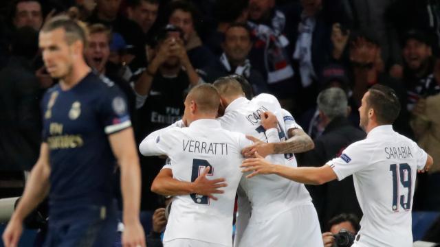 Los jugadores del PSG celebran un gol de Di María al Real Madrid