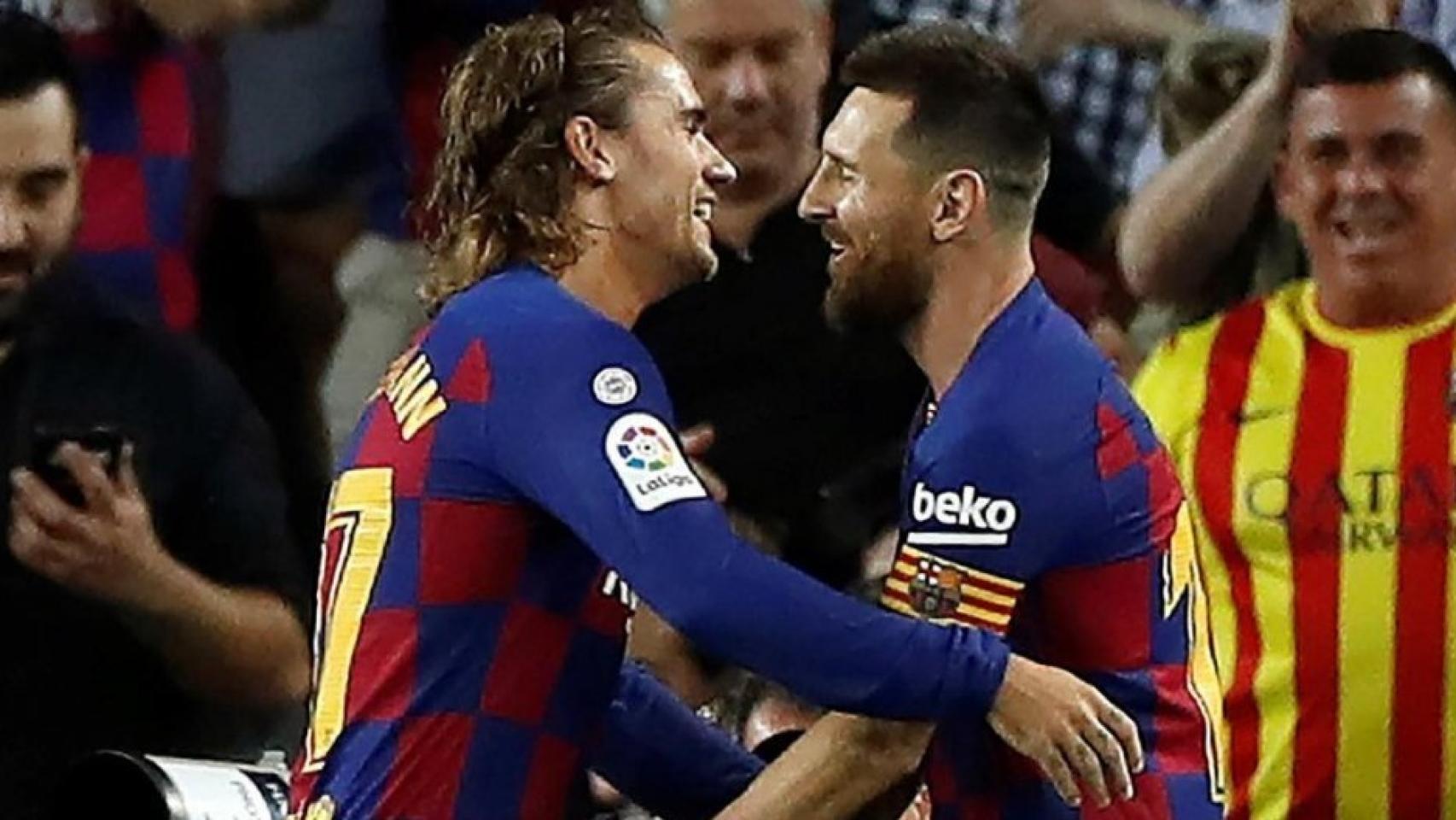 Messi y Griezmann celebrando un gol