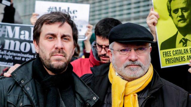 Toni Comín y Lluís Puig en un acto independentista.