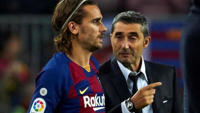 Antoine Griezmann y Ernesto Valverde durante un partido