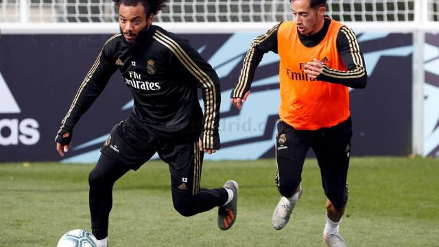 Marcelo con Lucas Vázquez en el entrenamiento.