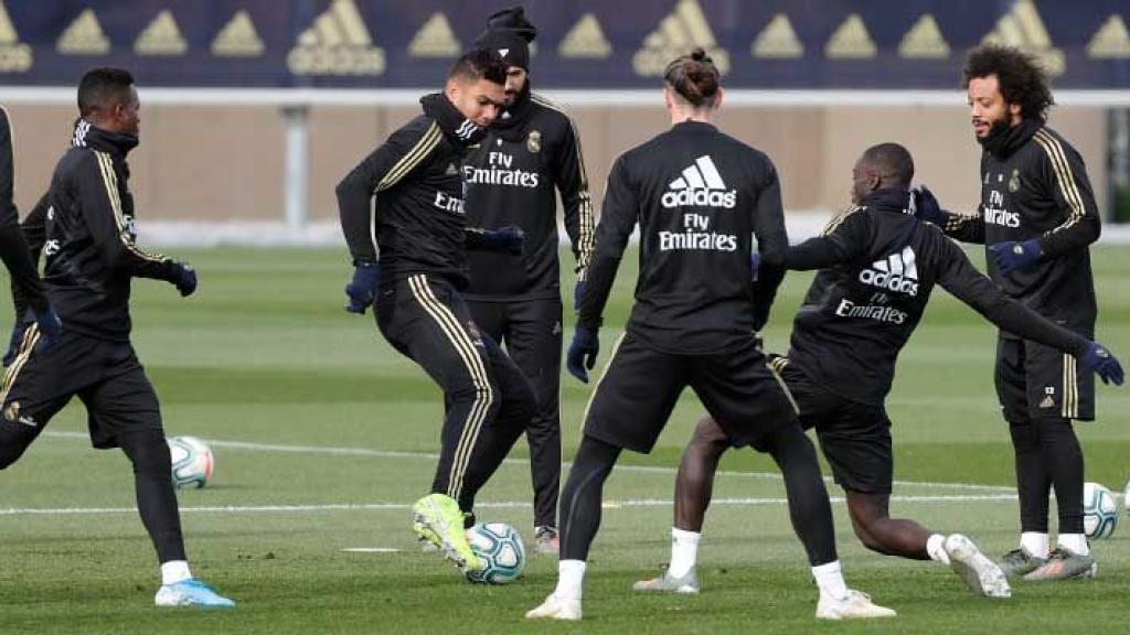 Los jugadores del Real Madrid, durante el entrenamiento