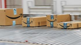 Amazon packages are transported by conveyor belts inside of an Amazon fulfillment center on Cyber Monday in Robbinsville, New Jersey