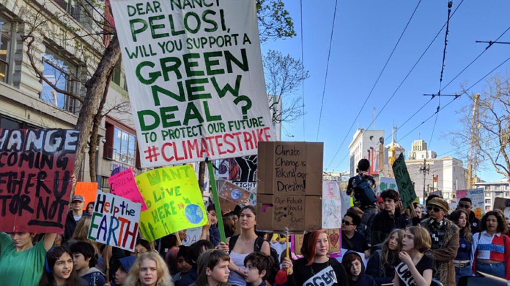 Protesters-march-with-signs