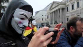 Policías y guardias civiles afiliados a Jusapol participan en una manifestación contra el Gobierno en el Congreso.