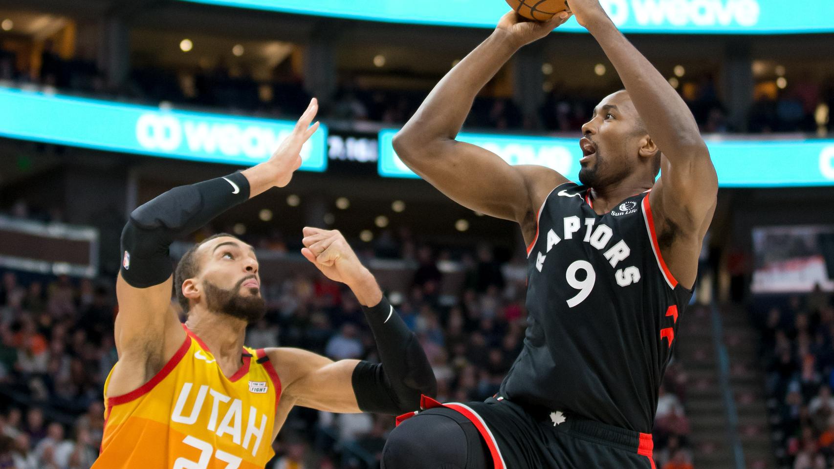 Serge Ibaka, defendido por Rudy Gobert