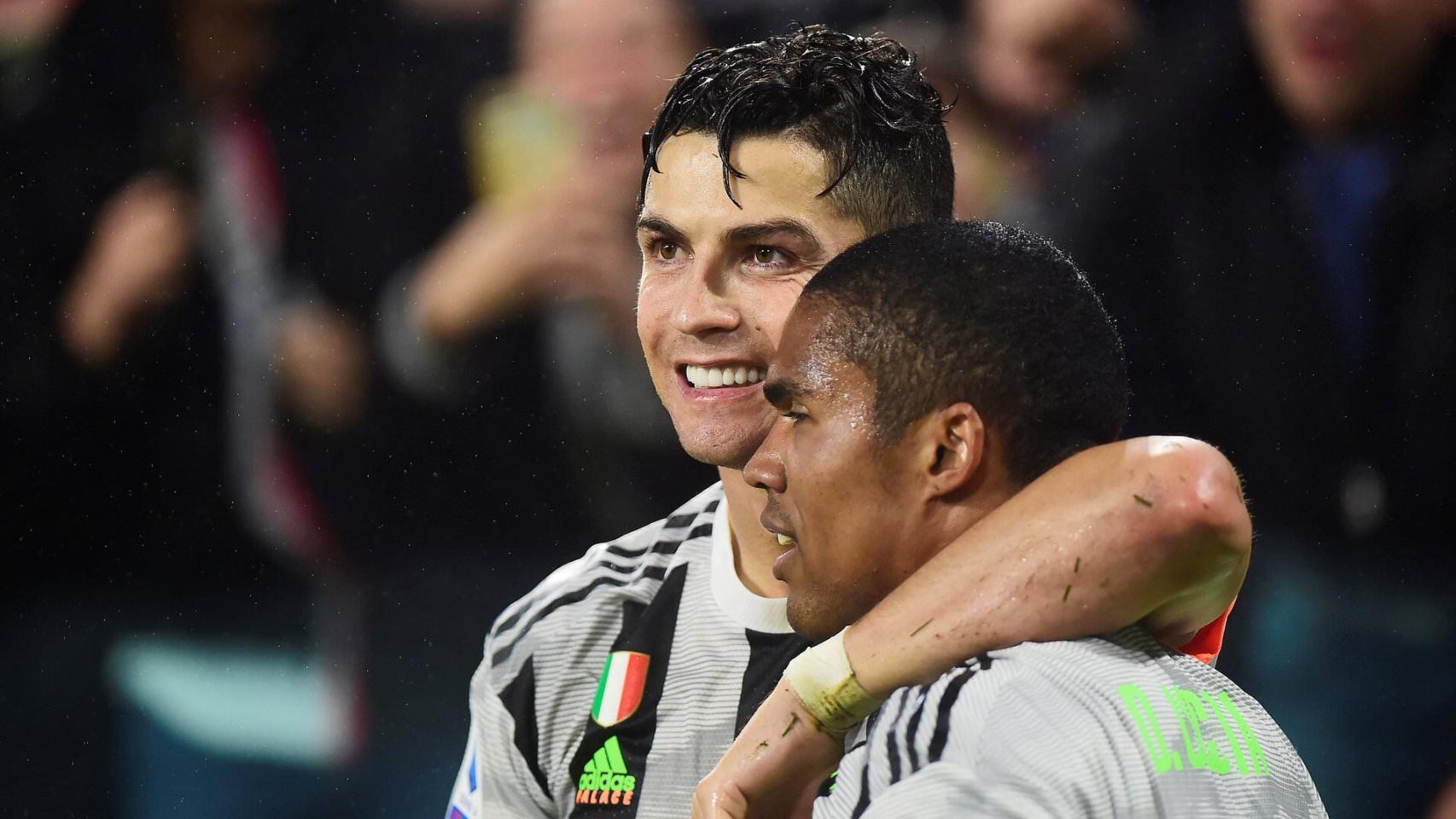 Cristiano y Douglas Costa