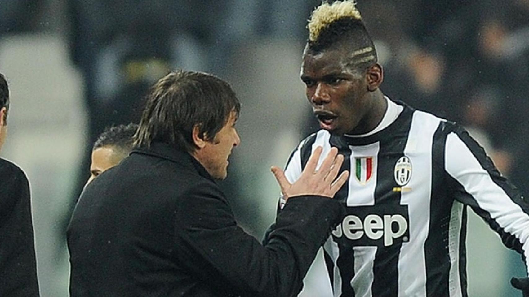 Antonio Conte y Paul Pogba