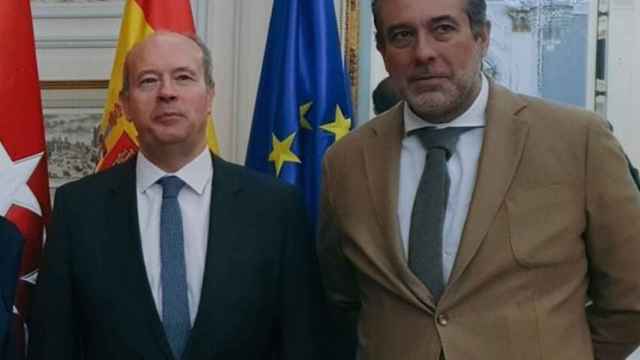 El ministro de Justicia, Juan Carlos Campo, y el responsable de Justicia del PP./