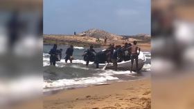 El desembarco de 400 inmigrantes en una playa de Murcia.