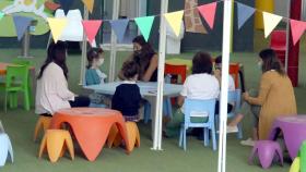 Los alumnos en clase con las mascarillas puestas.