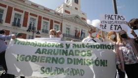 Varios manifestantes en la concentración convocada por el sindicato de Vox.