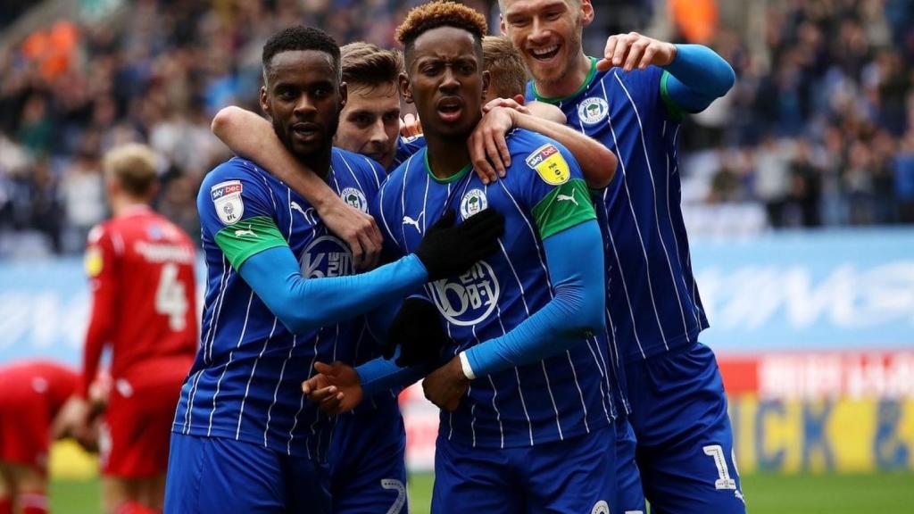 Los jugadores del Wigan, durante un partido de la temporada 2019/2020