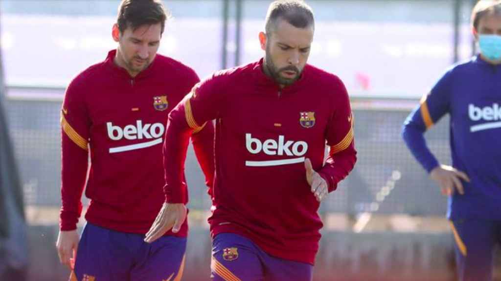 Jordi Alba, con Messi